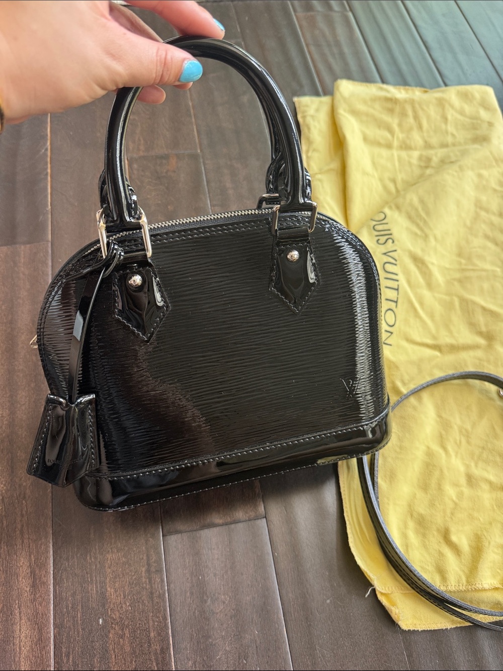 Authentic Louis Vuitton Alma BB in Black Epi Electric patent leather